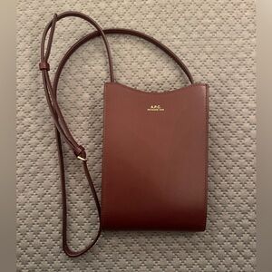 A.P.C. Jamie Neck Pouch crossbody purse in Vino